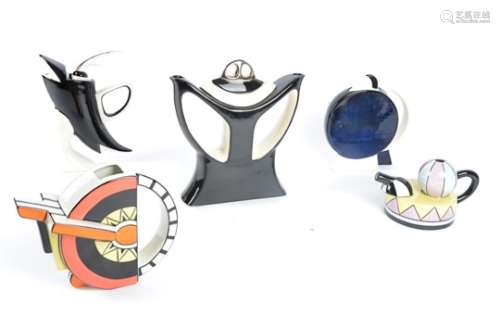 A collection of modern pottery jugs and teapots, three by designer Gary Seymour, one a highly