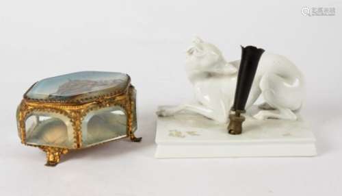 A Rosenthal figural inkwell, of a seated greyhound with head turned, blanc de chine 15cm x 10cm x