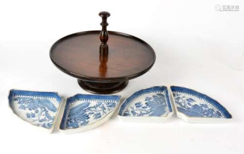 A 'lazy susan' stand with ceramic compartments, produced by Minton for Waring and Gillow, with