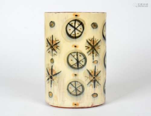 A contemporary pottery sleeve vase, the terracotta body with an ash glaze, decorated with stars