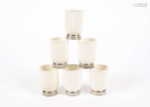 Keith Murray (1892-1981) for Wedgwood set of six beakers, in the 'Moonstone' glaze range, the