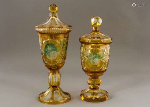 A pair of late 19th Century or early 20th Century Bohemian citrine lidded glass vases and covers,