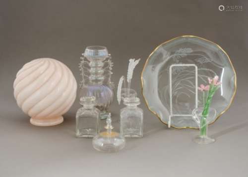 An opaque pink glass globular shade, together with an iridescent continental glass vase with