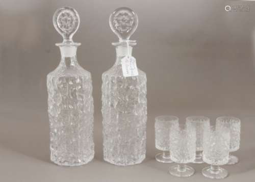 Geoffrey Baxter for Whitefriars, a pair of glacier range cylindrical decanters with stoppers with