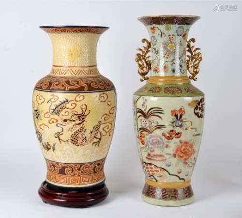 Two Oriental vases of substantial proportions, the tallest 61cm, decorated with flowers and with