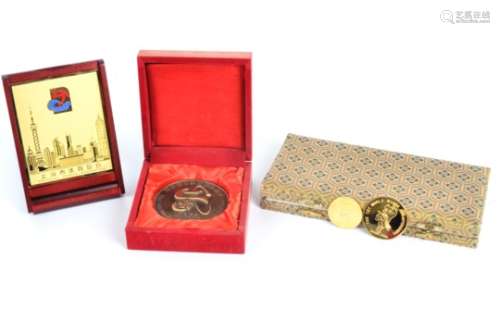 The World Wushu Championships medallion, a plaque for the Shanghai Sports Federation and Wushu