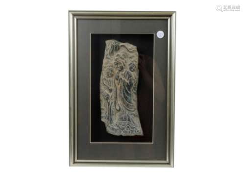 A Chinese soapstone of irregular shape carved in relief with the figures of three women in