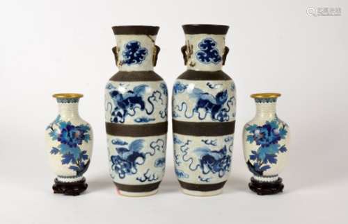A pair of Chinese crackleware vases, with three glazed sections, divided by bisque borders, each