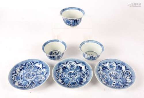 Three blue and white tea bowls and saucers, in the Kraak tradition but later, divided into