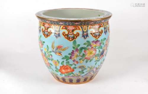 A large 20th Century Chinese Famille Rose porcelain fish bowl, the sides of the bowl decorated