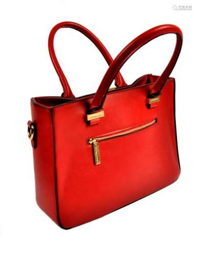 A Victoria Beckham handbag, structured style in red leather, embossed zip pocket, gold tone