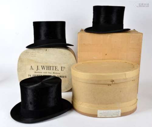 An A J White top hat, internal circumference approximately 54cm, internal height approximately 15cm,