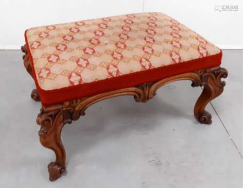 A fine quality William IV carved mahogany rectangular footstool, floral carved cartouche frieze,