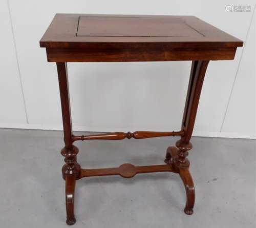 A William IV mahogany tulip table, rectangular top with central lift out panel revealing a metal