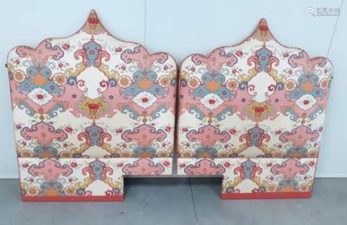 A two piece upholstered headboard, in a minaret form and fabric design, 204cm x 130cm