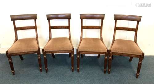 A set of four William IV mahogany dining chairs, fluted front supports and drop in seats