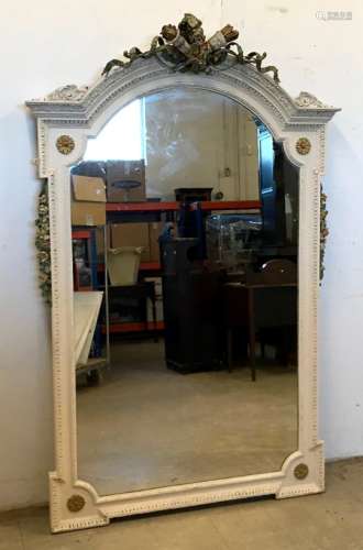 A large late 19th Century white painted mirror, having plaster quiver and torch with painted