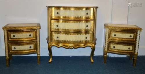 A continental gilt painted chest of drawers and pair of bedside cabinets, three long drawers with