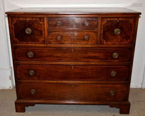 A antique mahogany chest of drawers, two short central drawers , flanked by two short deep to either