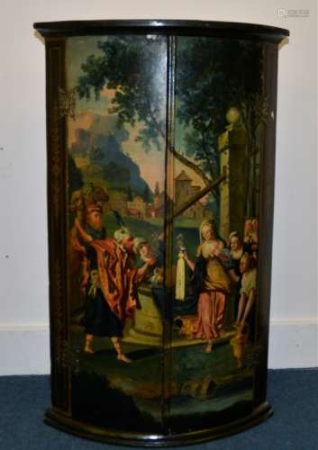 An antique painted corner cupboard, curved with two hinged panel doors painted with a take on the