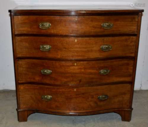 A late 19th Century Maples & Co serpentine mahogany chest of drawers shaped reeded top with four