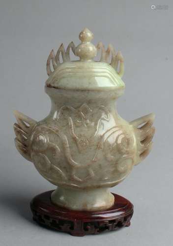 A Carved Jade Vase with Lid