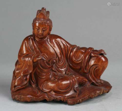 A Chinese HuangHuaLi Carved Seated Guanyin Statue