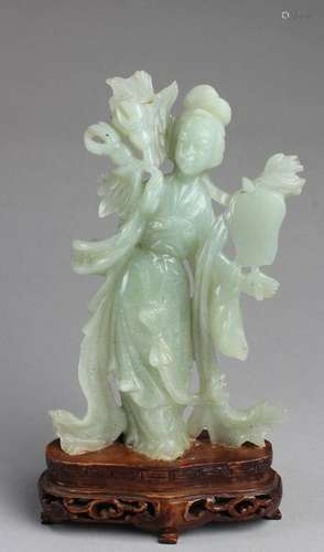 A Carved Jade Maiden Figurine