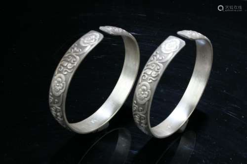 A Pair of Chinese Carved Bangles