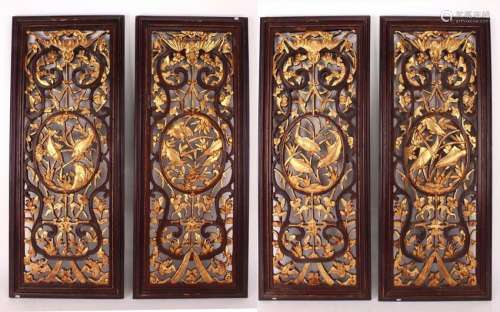 FOUR PIERCED AND GILDED PANELS