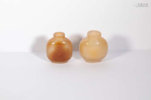 A group of clear ice sugar agate snuff bottles