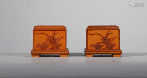 Plum orchid bamboo and chrysanthemum bamboo in Qing Dynasty. Yellow seal box pair