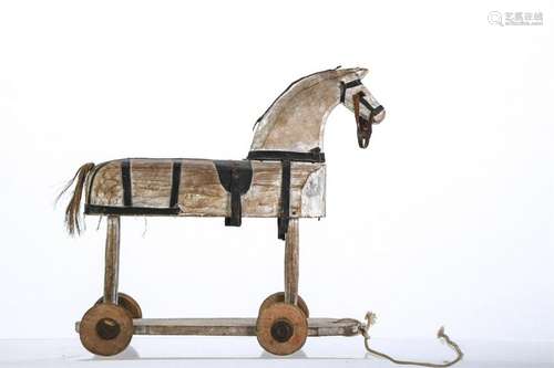 FOLKY CARVED AND STAINED WOODEN HORSE PULL TOY