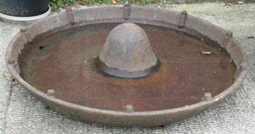 A cast iron Mexican Hat pig feeder / planter, 86cms (34ins) diameter.