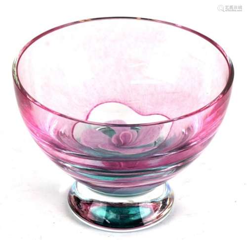 A Caithness footed glass bowl with central flower decoration, 16cms (6.25ins) diameter.