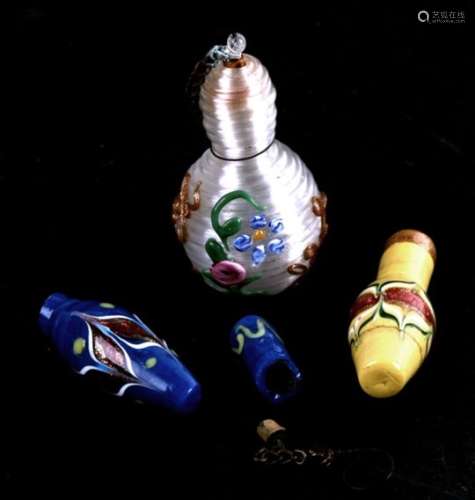 Three late 19th / early 20th century Venetian glass scent bottles, the largest 5cms (2ins) high. (