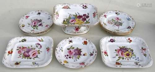 An early 19th century English porcelain dessert service comprising of eight plates, two serving