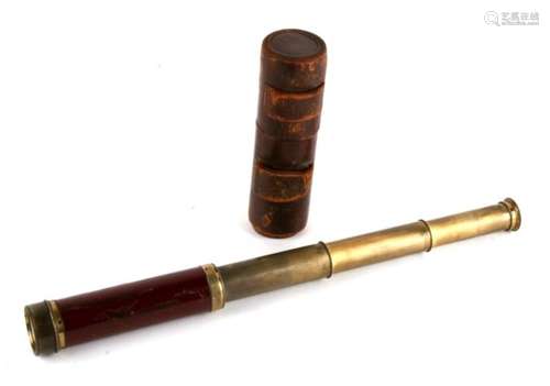 A late 19th century Dolland three-draw pocket telescope in leather case.