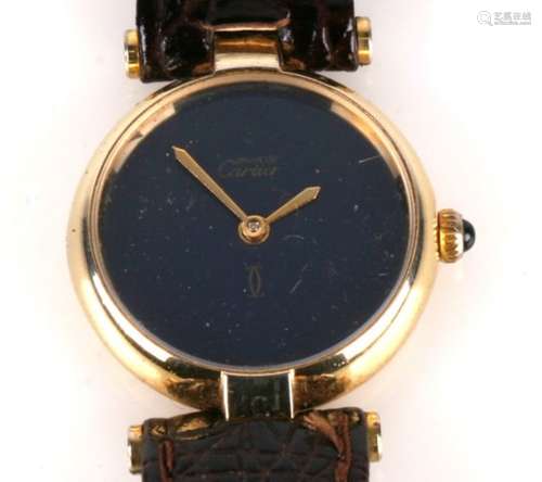 A ladies Must de Cartier wrist watch with plain black dial in silver gilt case no. 17 050343