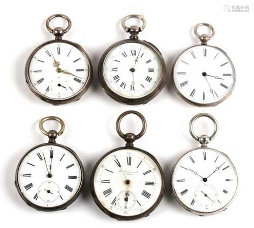 A group of six white metal cased open faced pocket watches