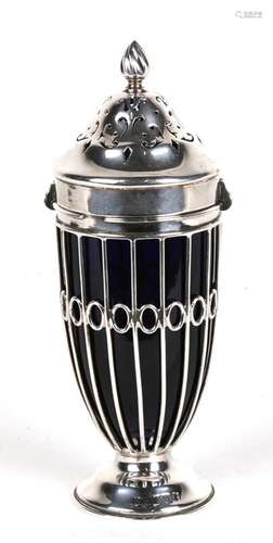 An Edwardian silver sugar caster with blue glass liner, London 1902, 17cms (6.75ins) high.