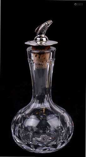 A cut glass and silver oil bottle with leaping salmon pourer, Birmingham 1975, 13cms (5ins) high.