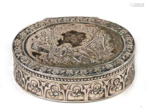 A continental silver oval snuff box decorated with harp, quiver of arrows and doves, 5cms (2ins)