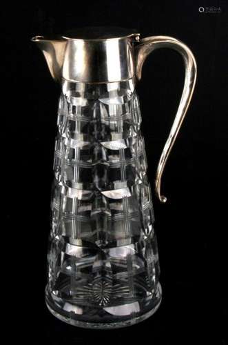 A Mappin & Webb cut glass claret jug with silver plated mounts 25.5cm 10ins high