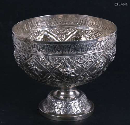 A late 19th / early 20th century Indian white metal (test as silver) pedestal bowl embossed with