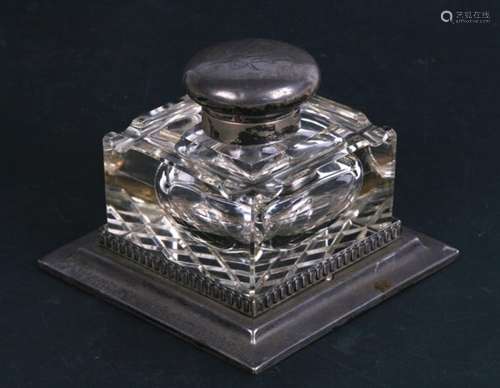 A silver mounted glass desk top inkwell, Sheffield 1912 and maker's mark for 'Walker & Hall',