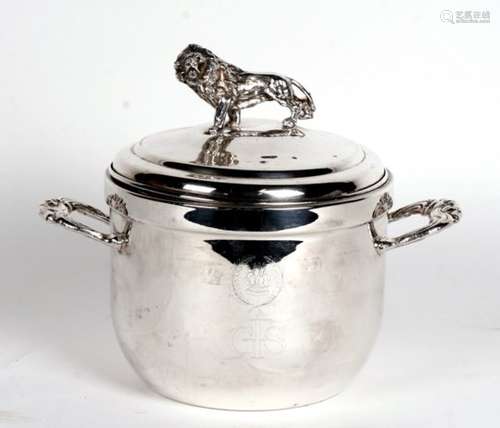 A silver plated two-handled ice bucket with inset ceramic pot and surmounted with a lion, 22cms (8.