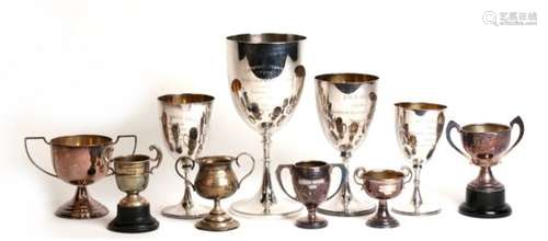 A quantity of silver plate trophies including '1929 Guard's Depot Tug of War'.