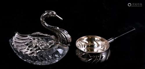 A continental white metal mounted glass dressing table box modelled as a swan, 12cms (4ins) high;