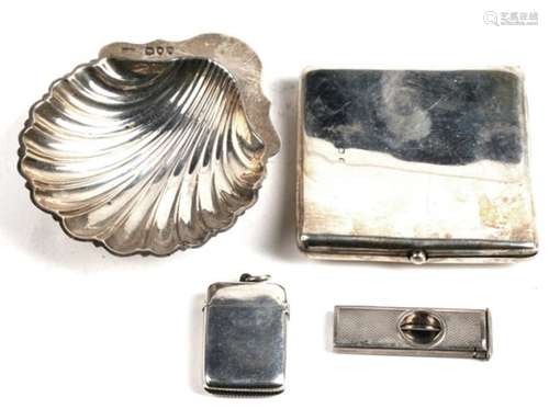 A silver cigarette case; together with a silver vesta; a silver cigar cutter and a silver shell